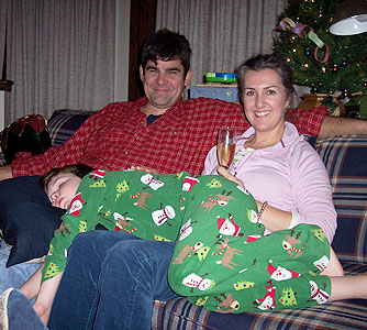 Mark and Bronwyn, with a passed out Aidan, await the dropping of the New Year's ball 